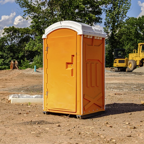 what is the cost difference between standard and deluxe portable toilet rentals in Amherst County
